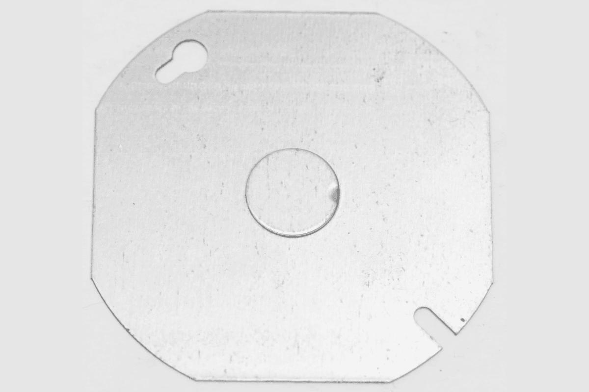 Silver square metal disc