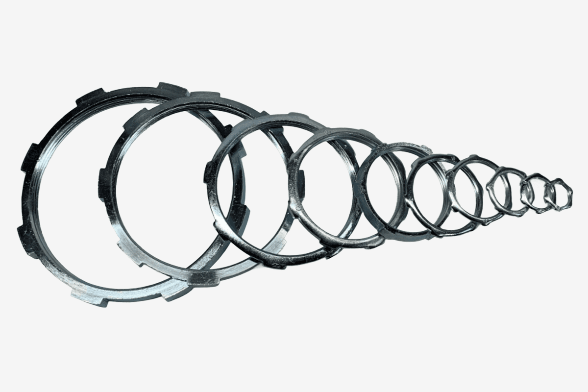 Stacked metal rings on white background