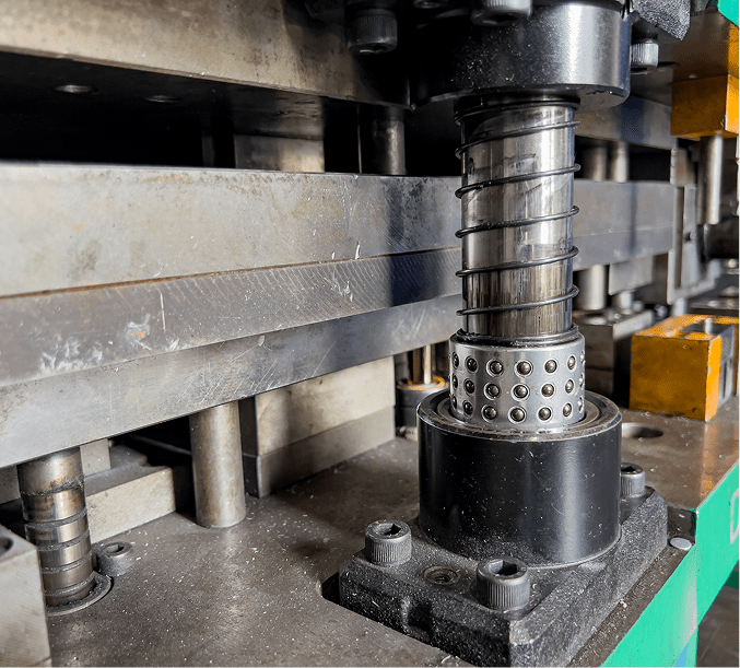 Heavy-duty machine part with cylindrical elements.
